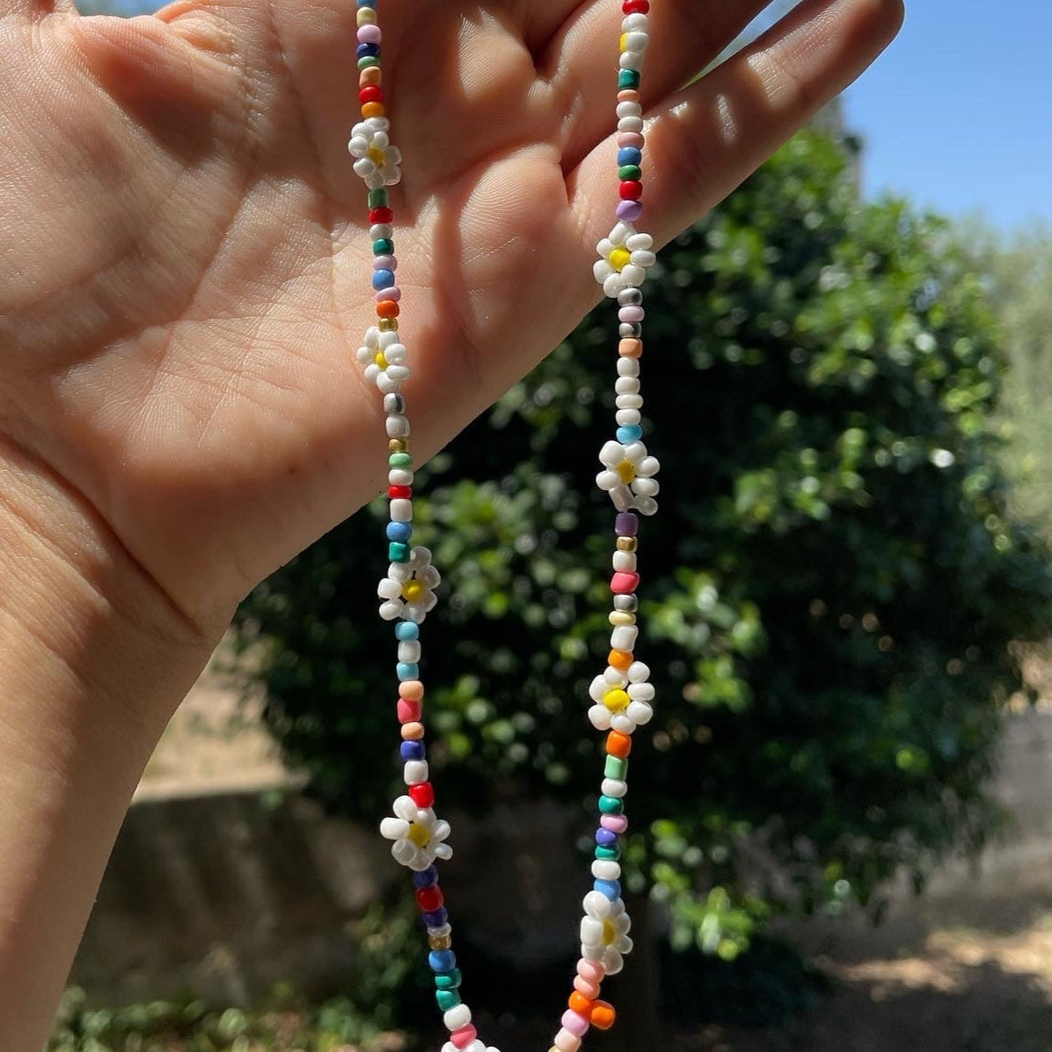 Collana con perline e fiori in 7 colori