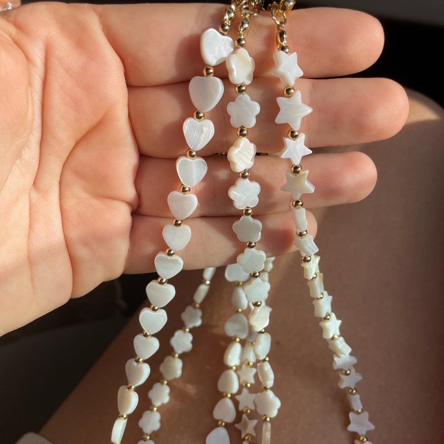 Collana con stelle in madreperla in 2 colori