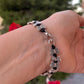 Bracciale con charm in 5 fantasie