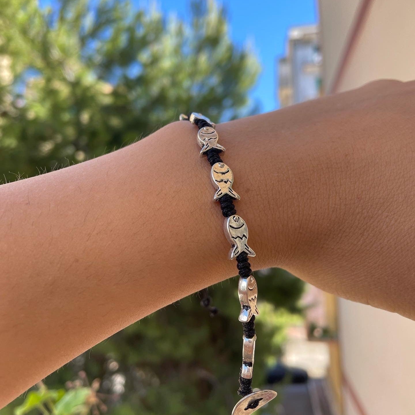 Bracciale con charm in 5 fantasie