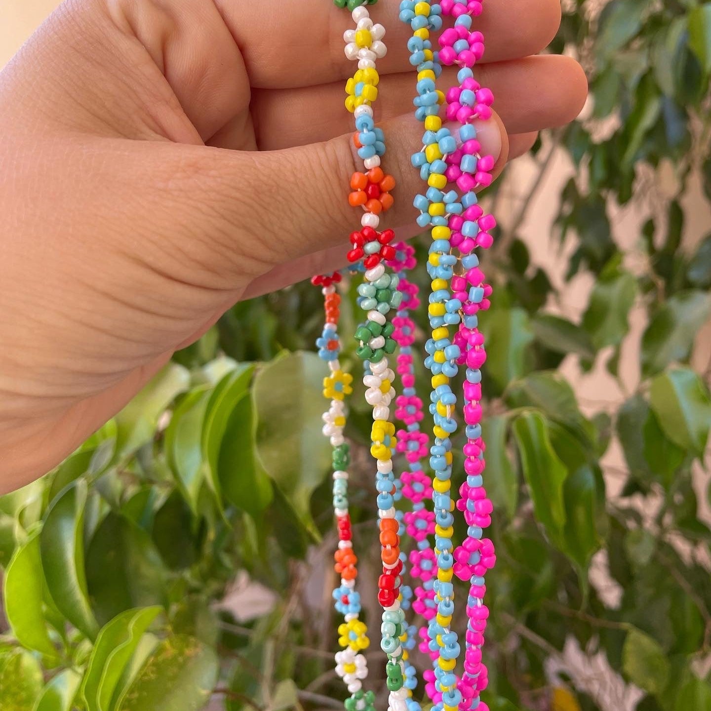 Collana con fiori in 3 colori