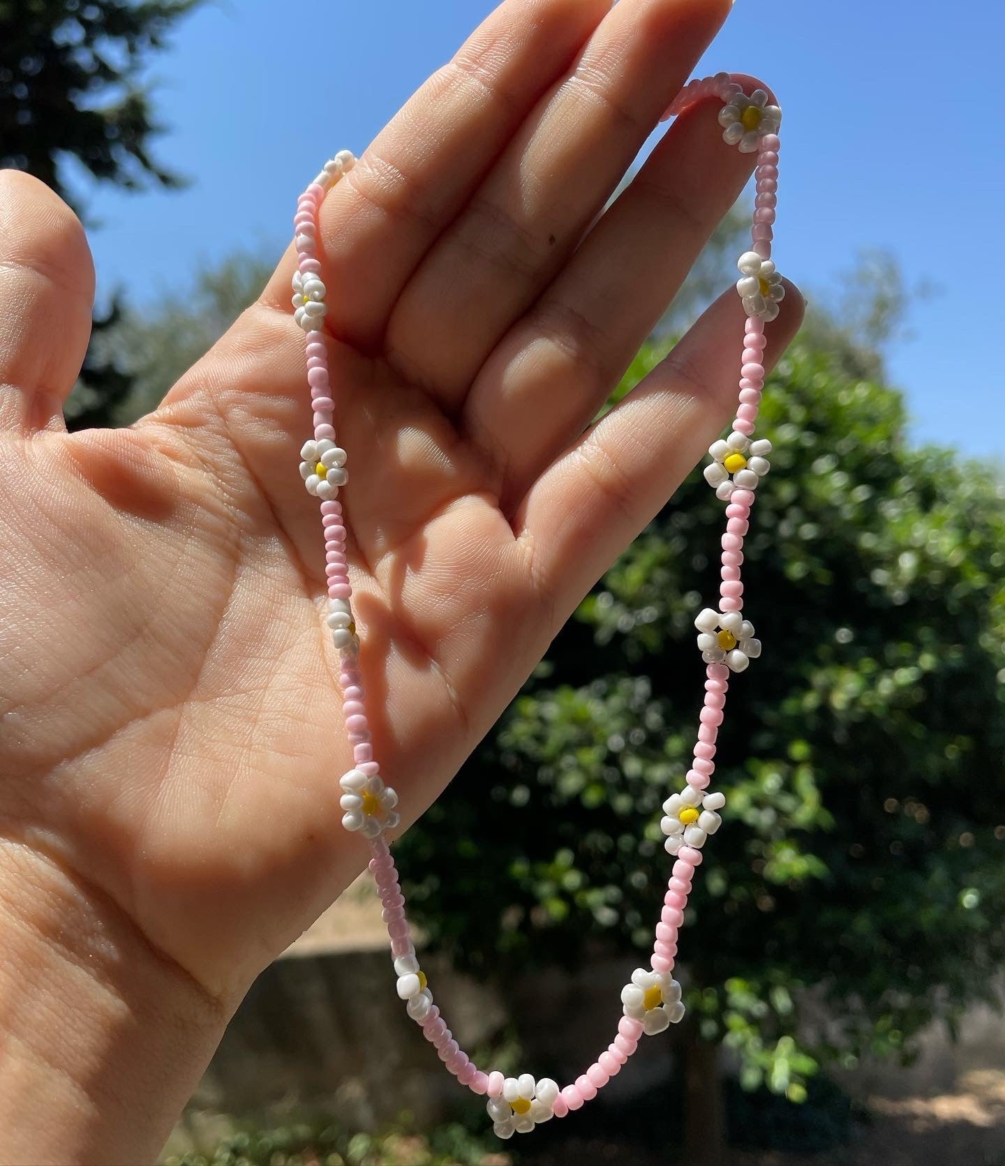 Collana con perline e fiori in 7 colori