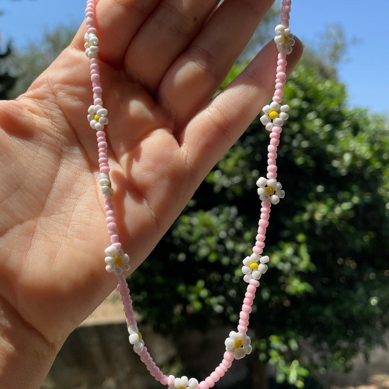 Collana con perline e fiori in 7 colori