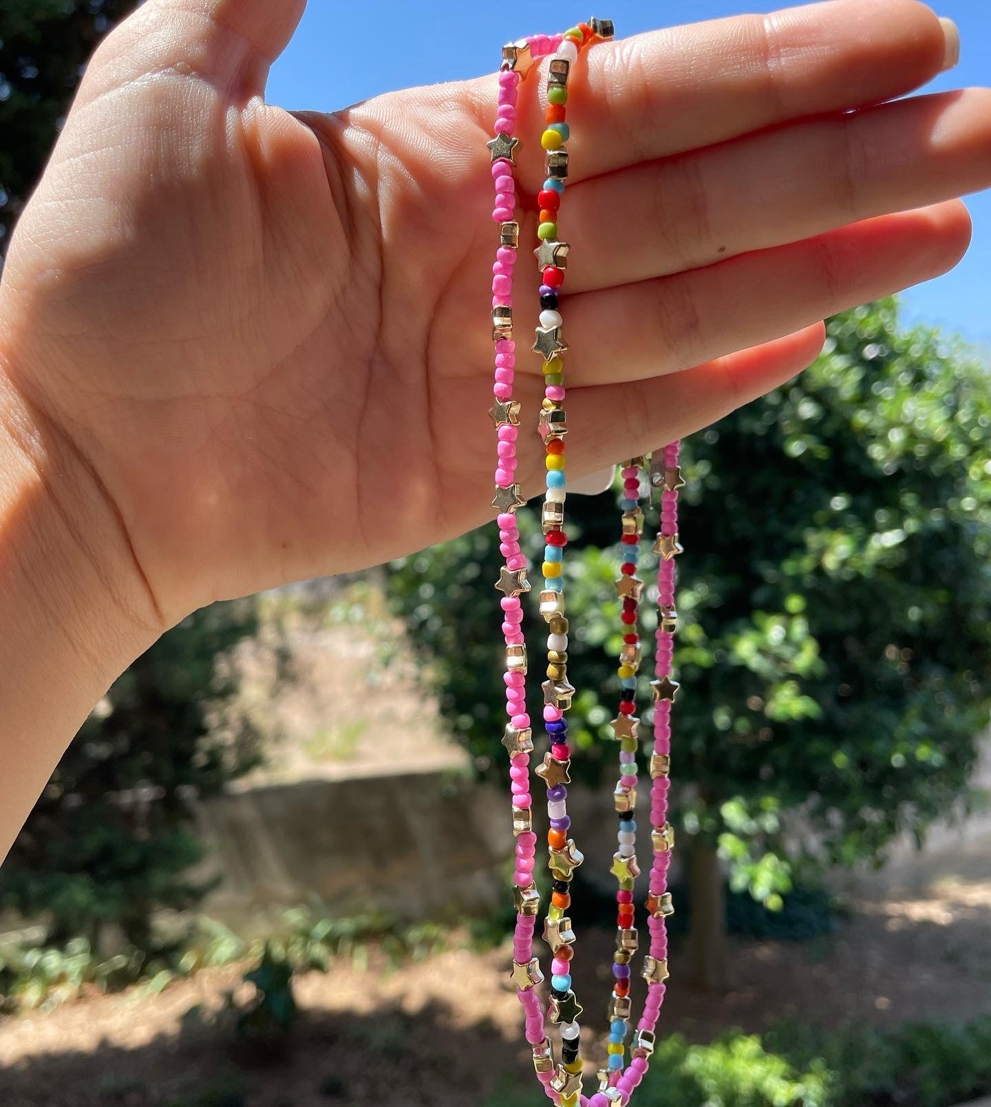 Collana con perline e stelle in 2 colori
