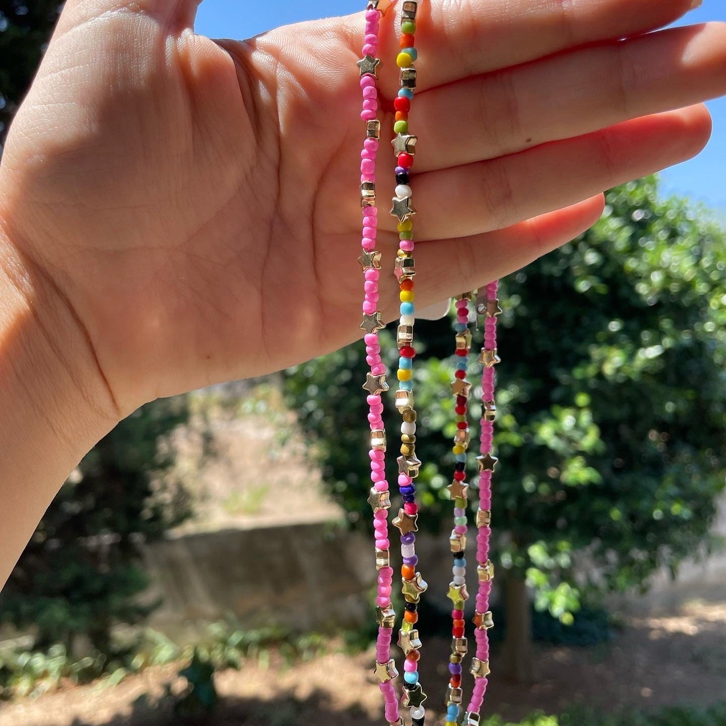 Collana con perline e stelle in 2 colori
