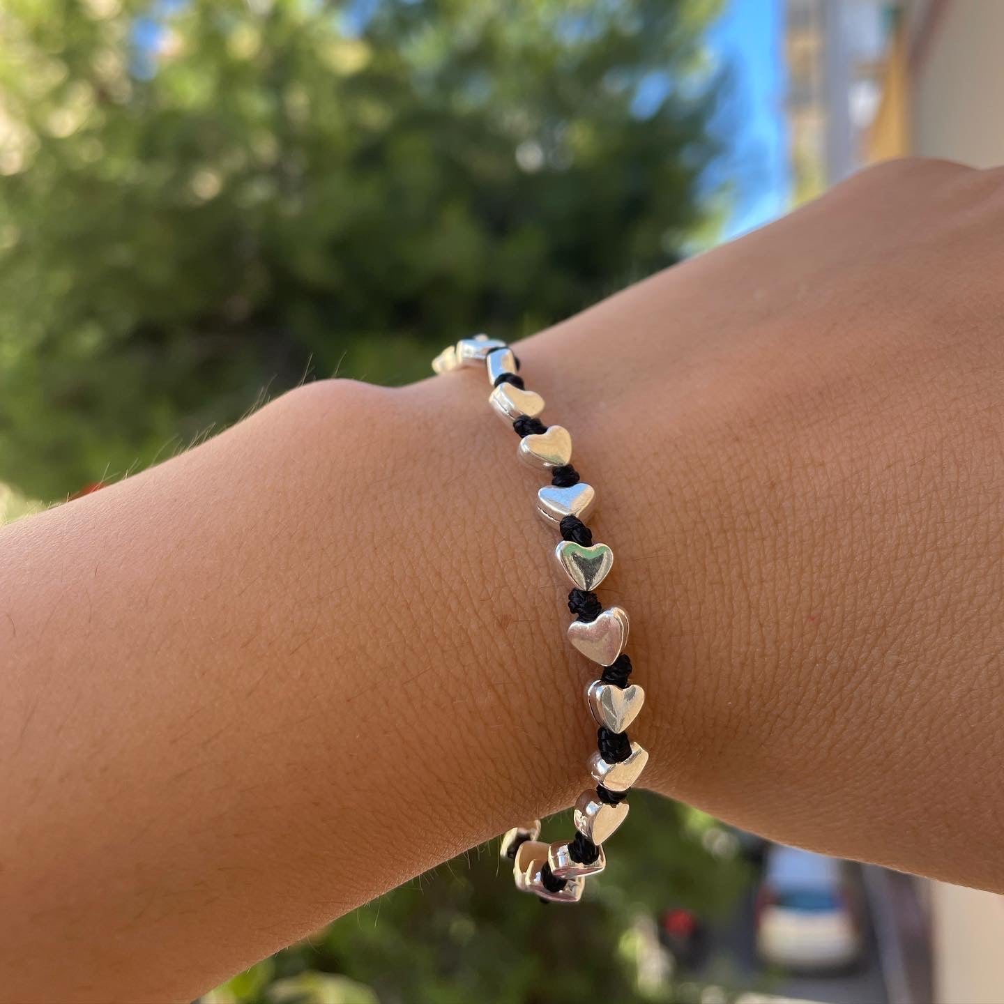 Bracciale con charm in 5 fantasie