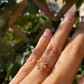 Anello con fiore in 12 colori