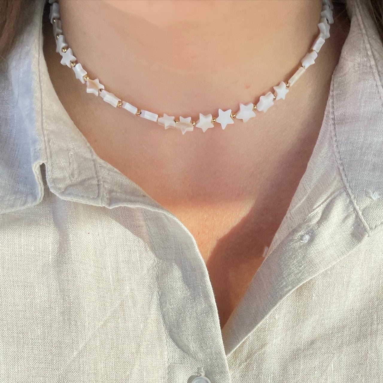 Collana con stelle in madreperla in 2 colori