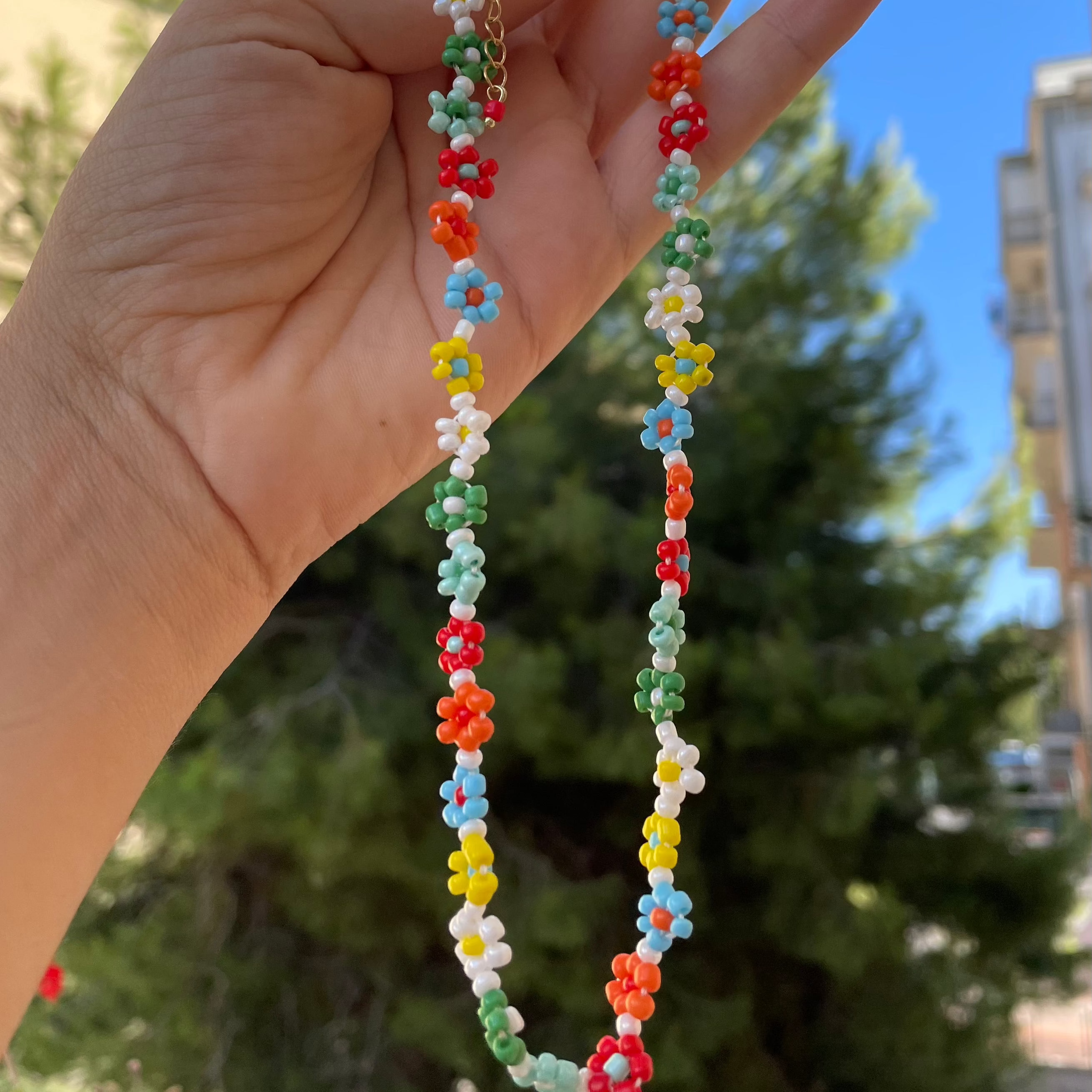 Collana con fiori in 3 colori