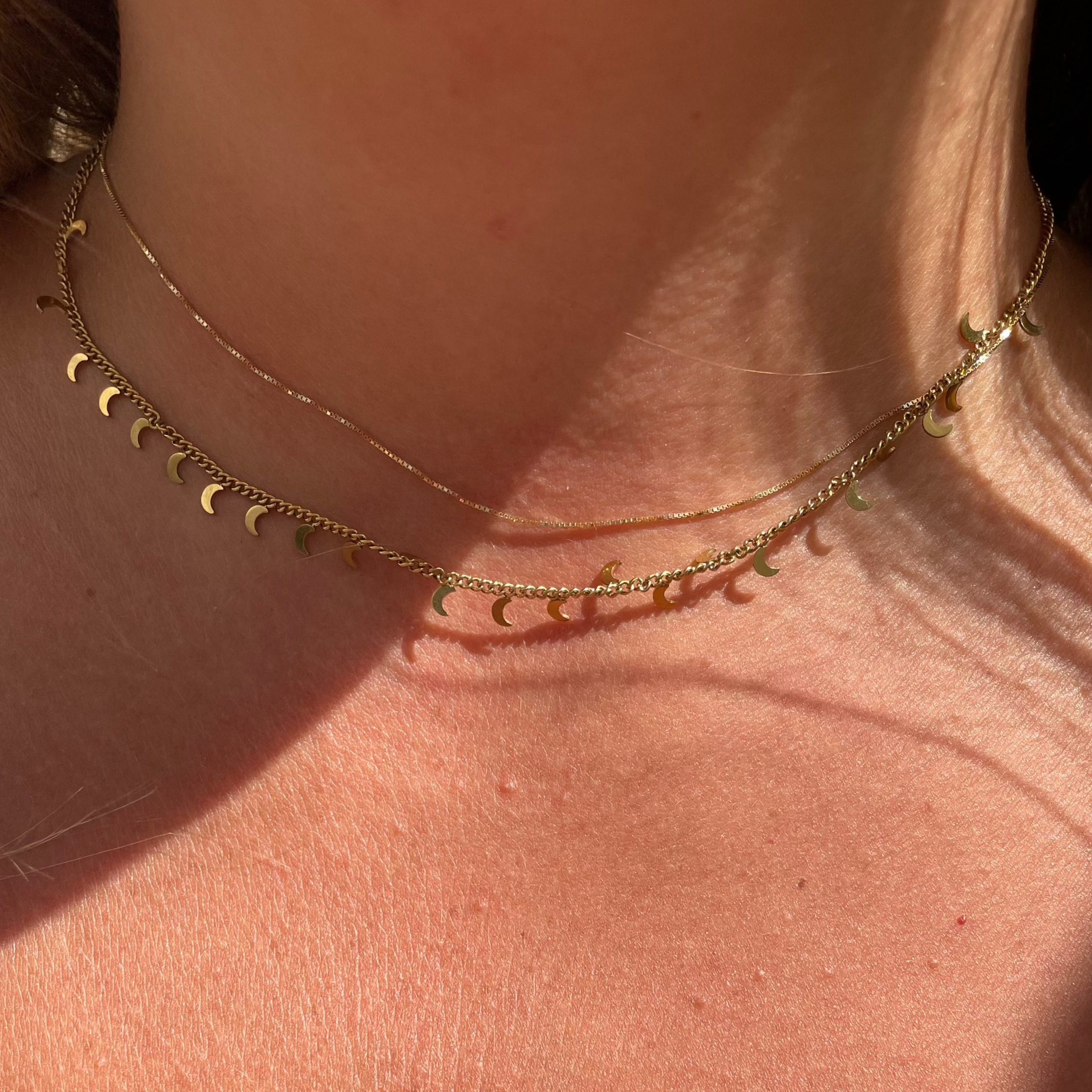 Collana con lune in 2 colori