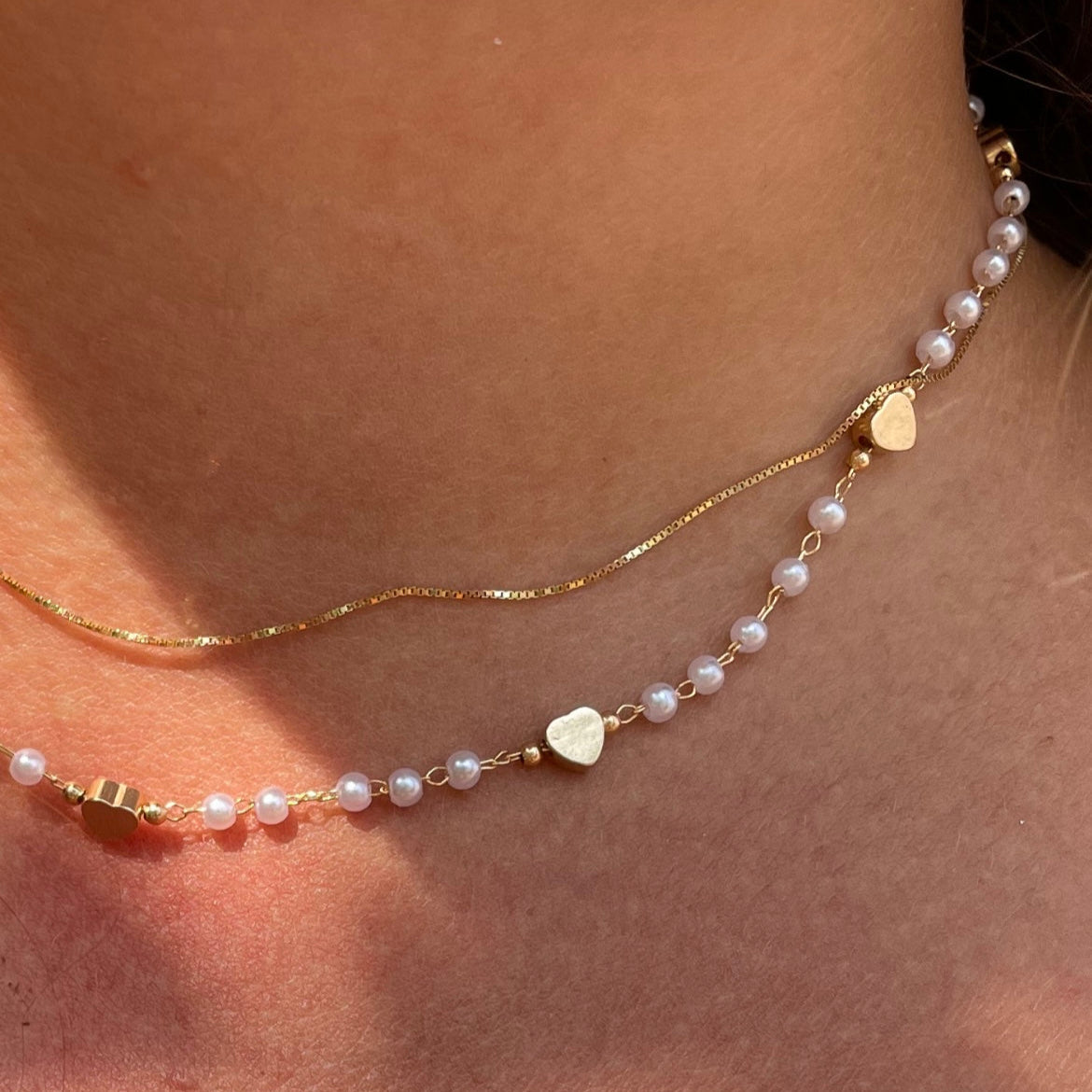 Collana con piccole perle e cuori
