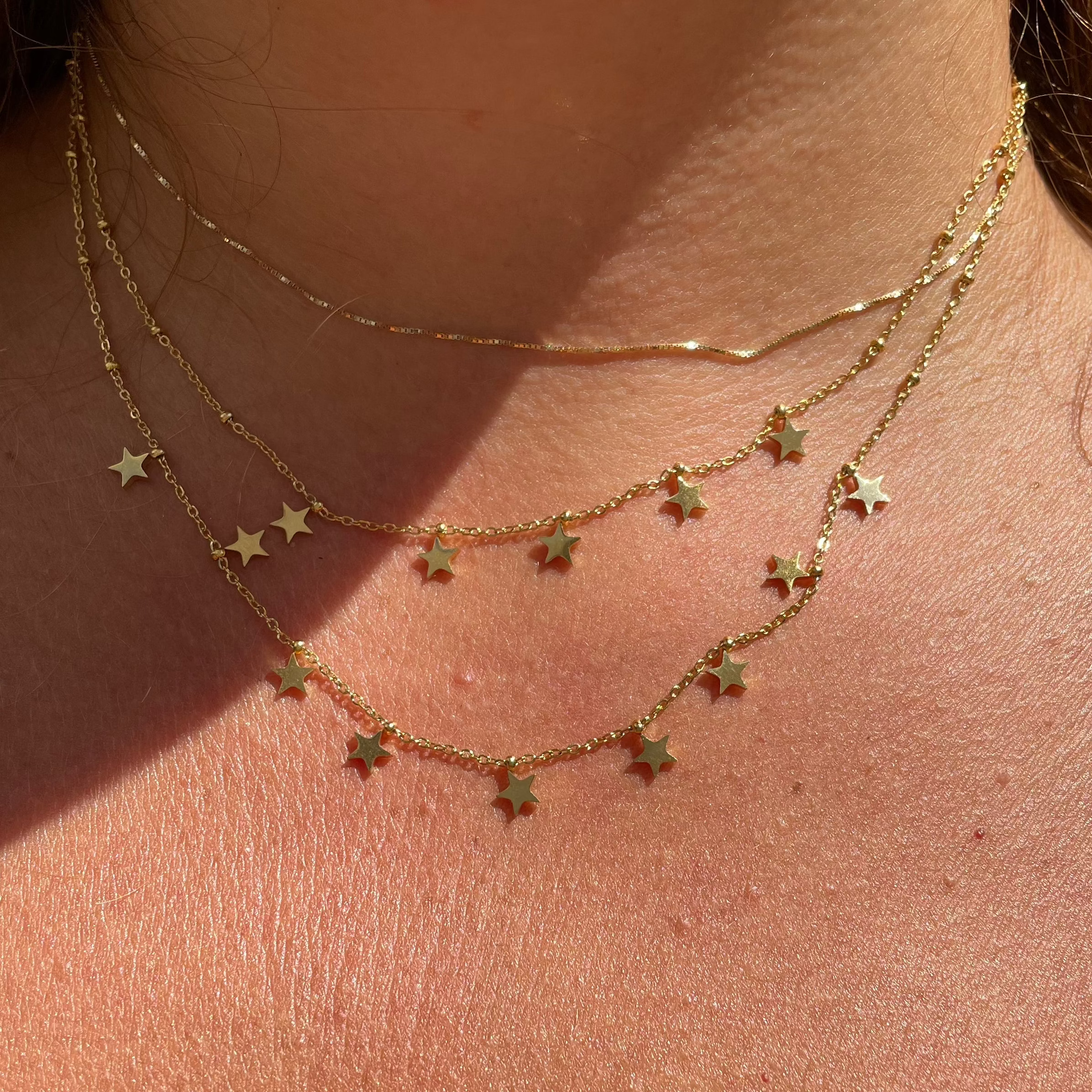 Collana a doppio giro con stelle in 2 colori