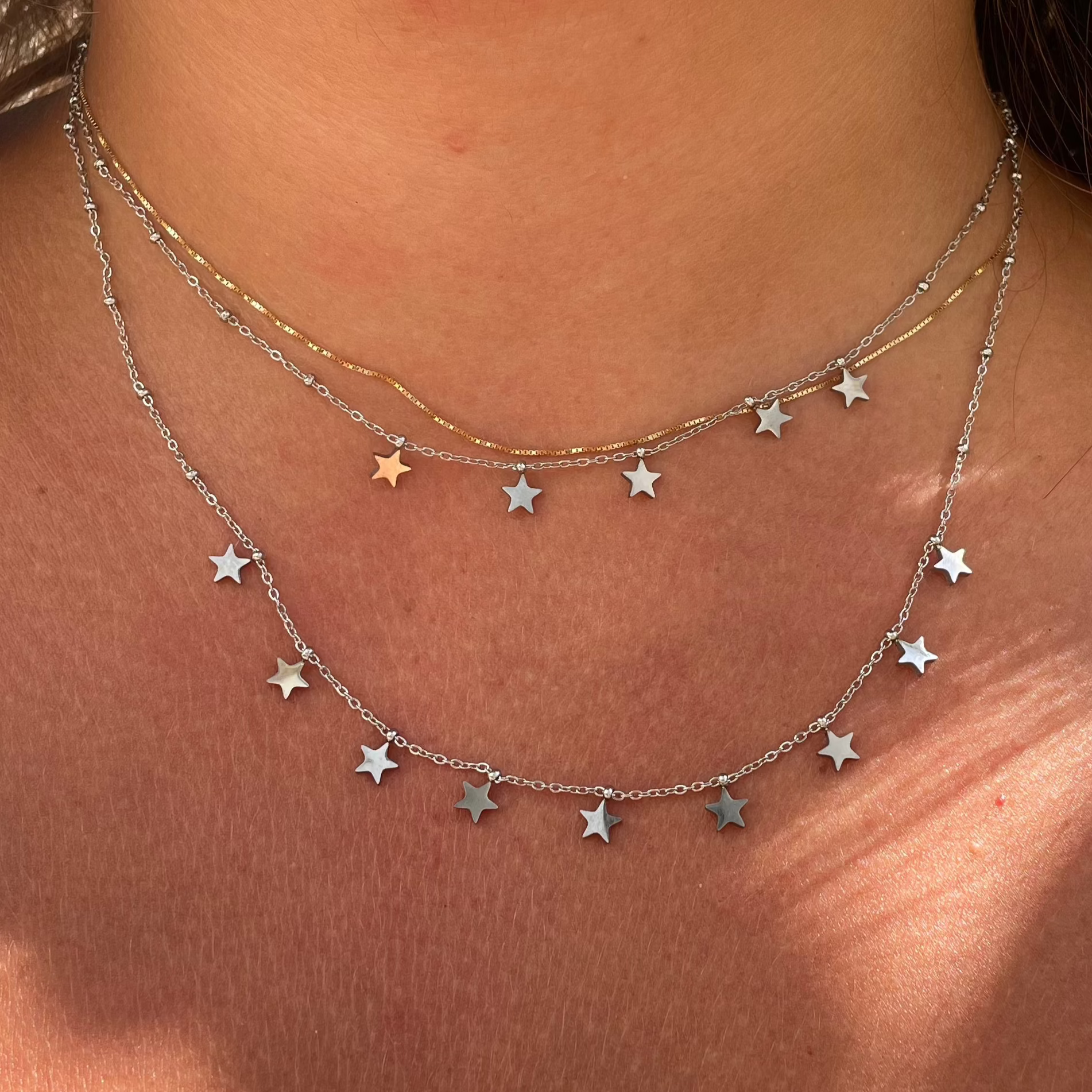 Collana a doppio giro con stelle in 2 colori