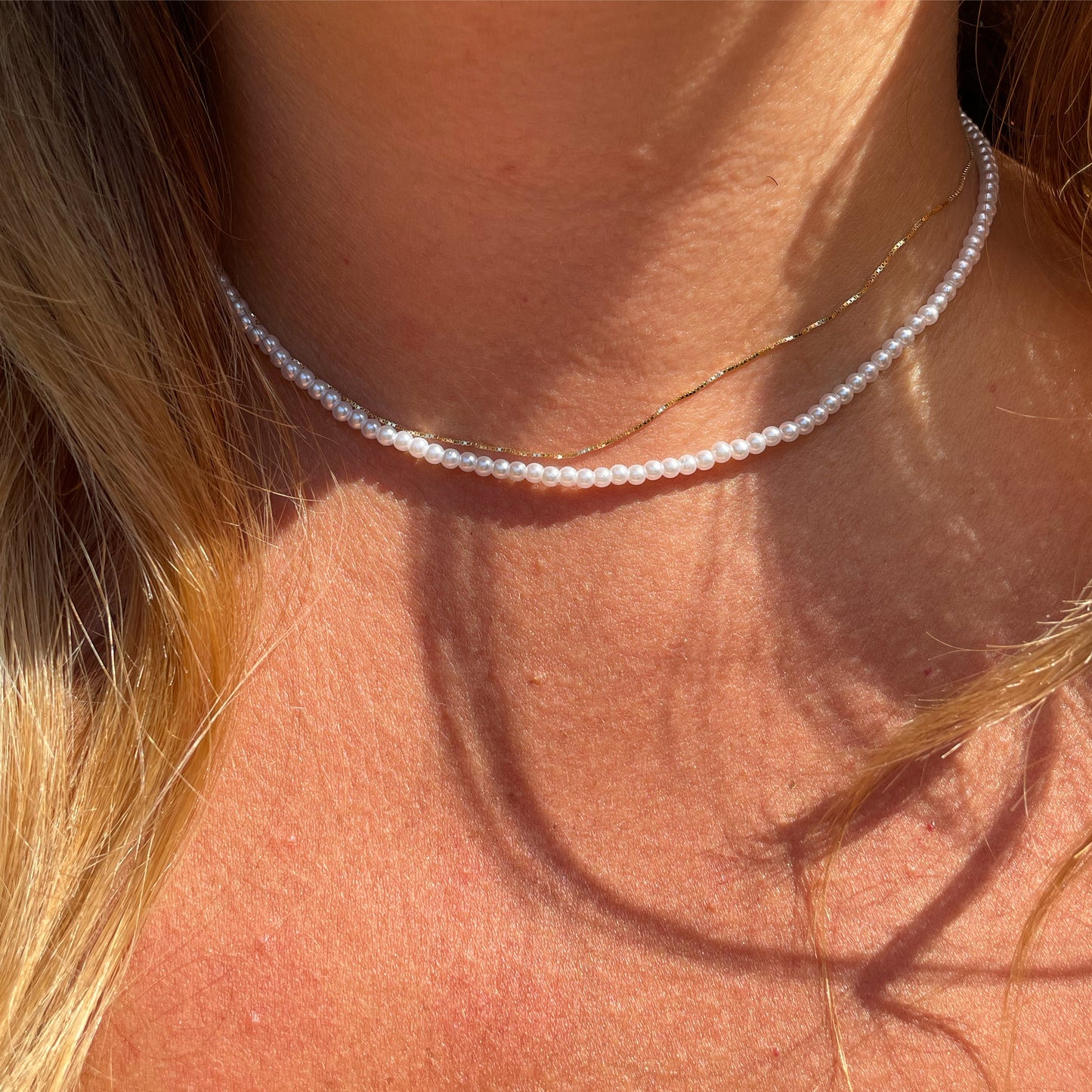 Collana con piccole perle in 2 colori