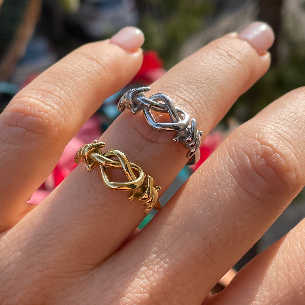 Anello con nodo d'amore in 2 colori