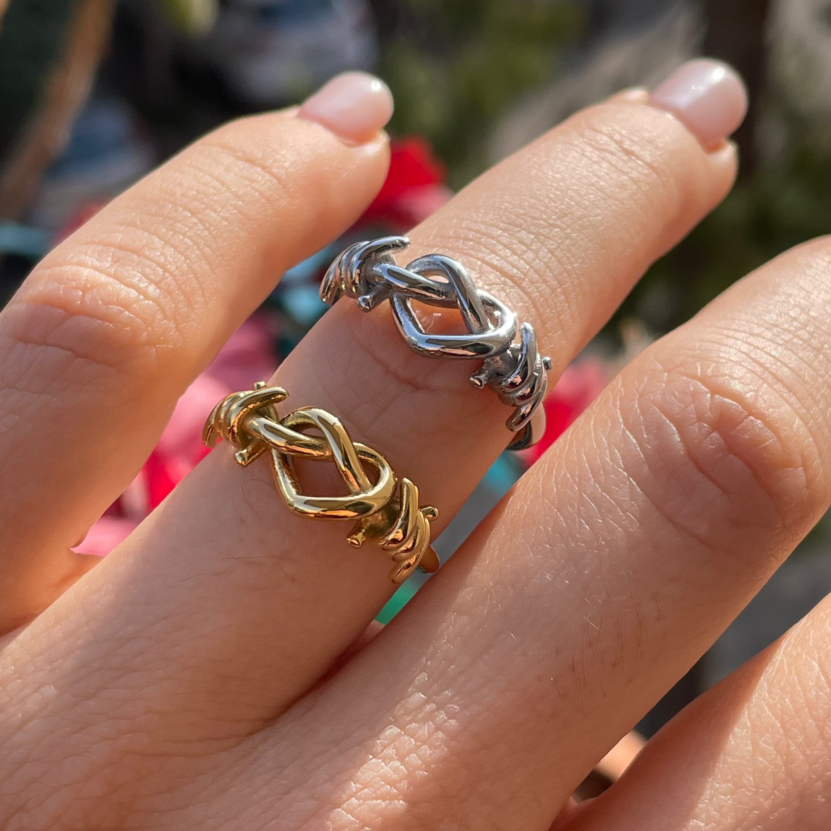 Anello con nodo che forma cuore in 2 colori