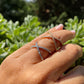 Anello incrociato con strass in 2 colori