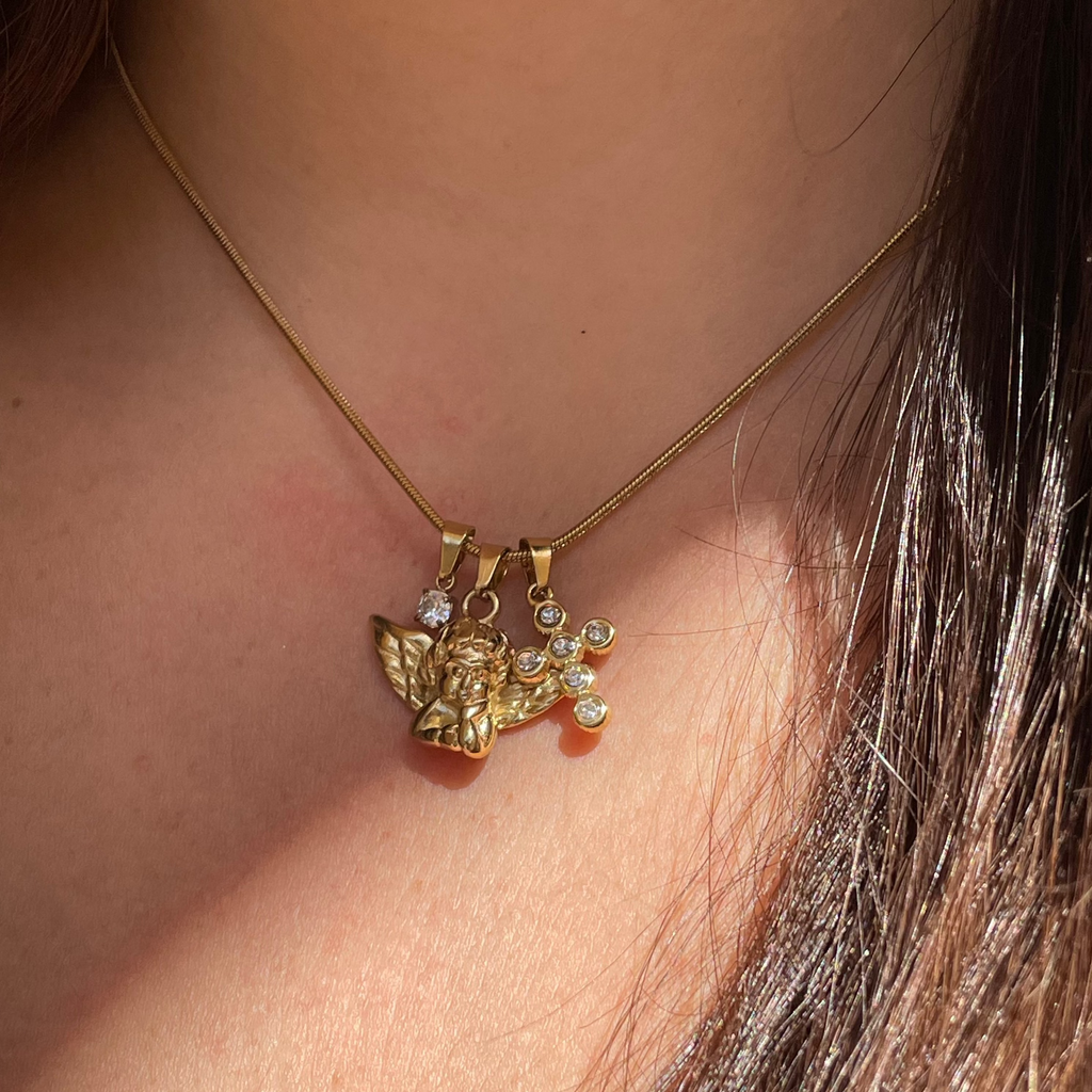 Collana angelo con croce e punto luce in 2 colori
