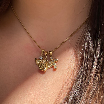 Collana angelo con croce e punto luce in 2 colori
