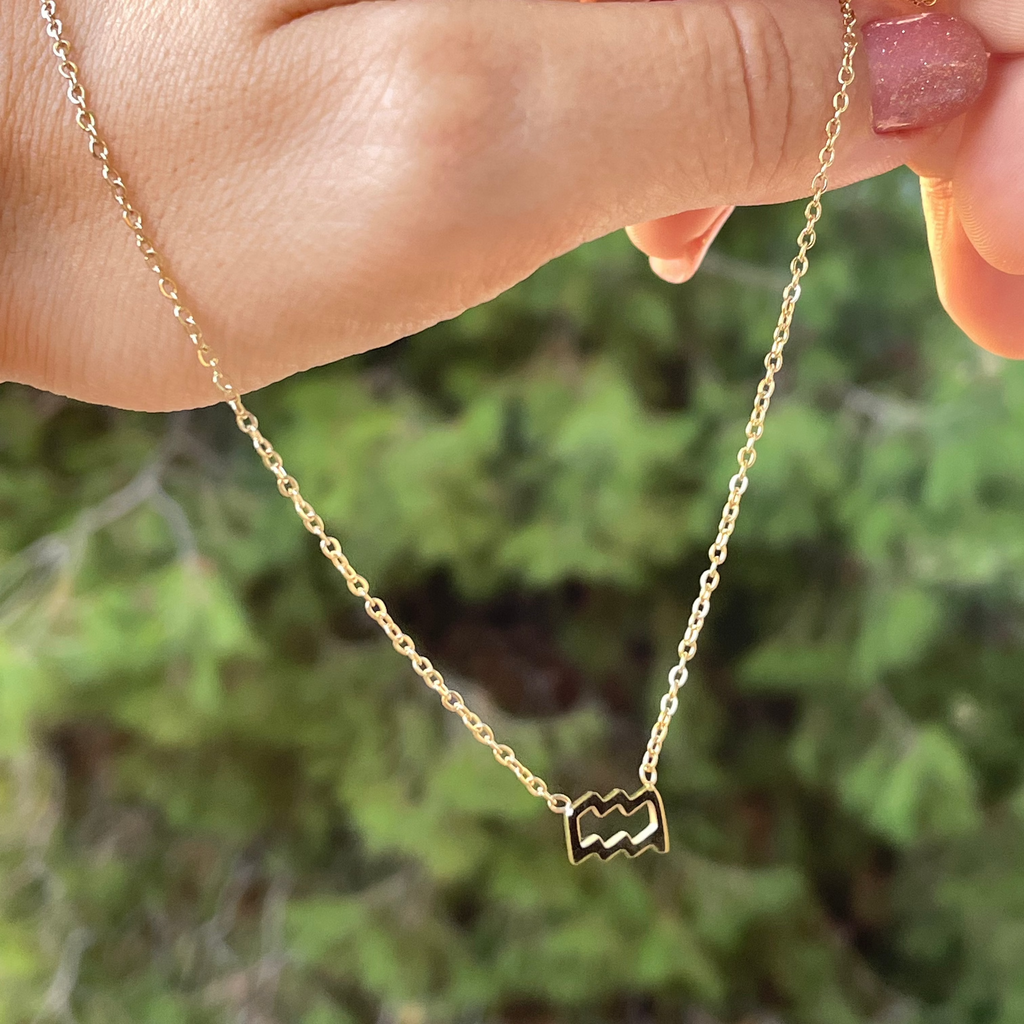 Collana con segno zodiacale in 2 colori