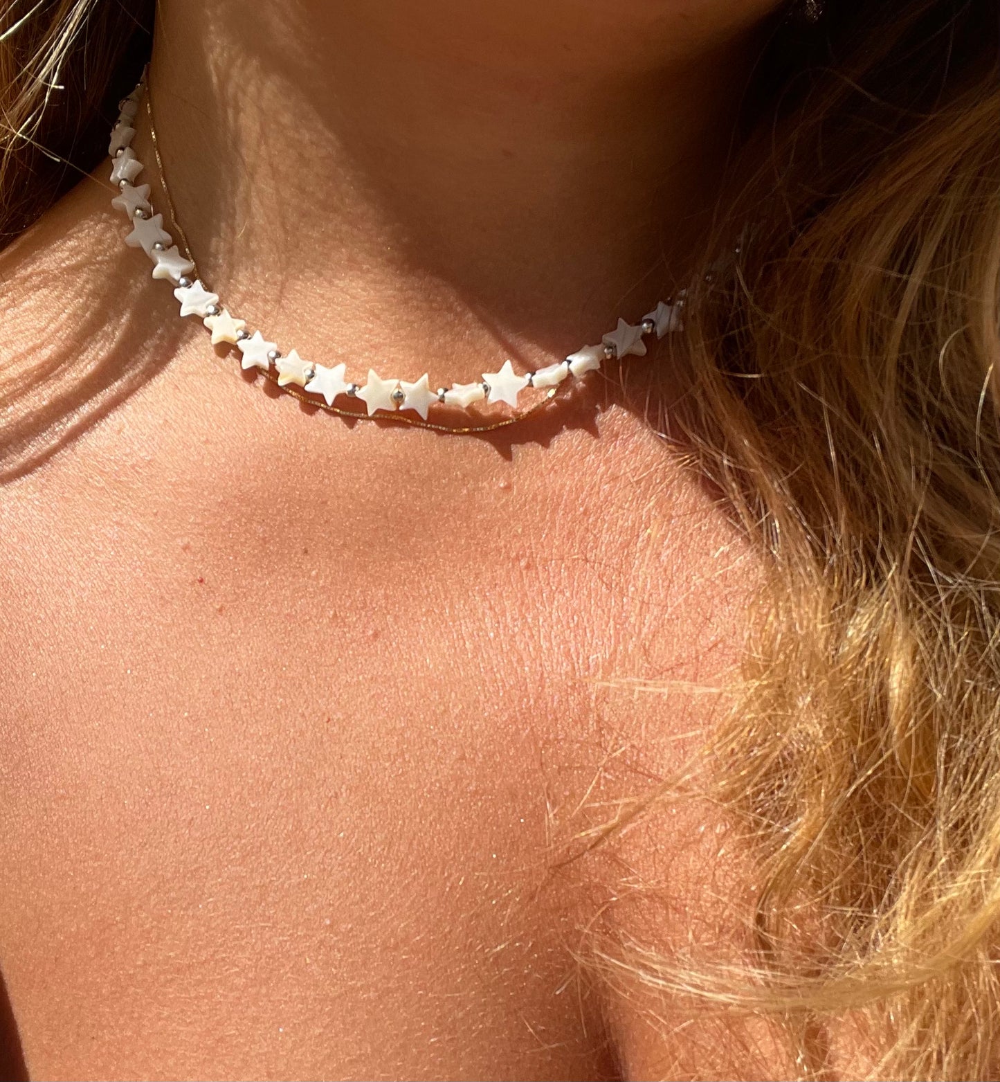 Collana con stelle in madreperla in 2 colori