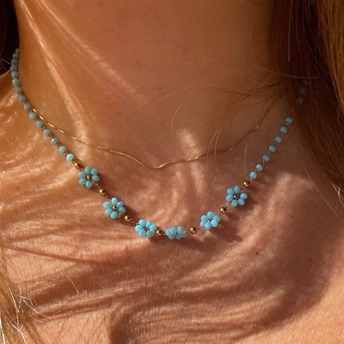 Collana con fiori in 2 colori