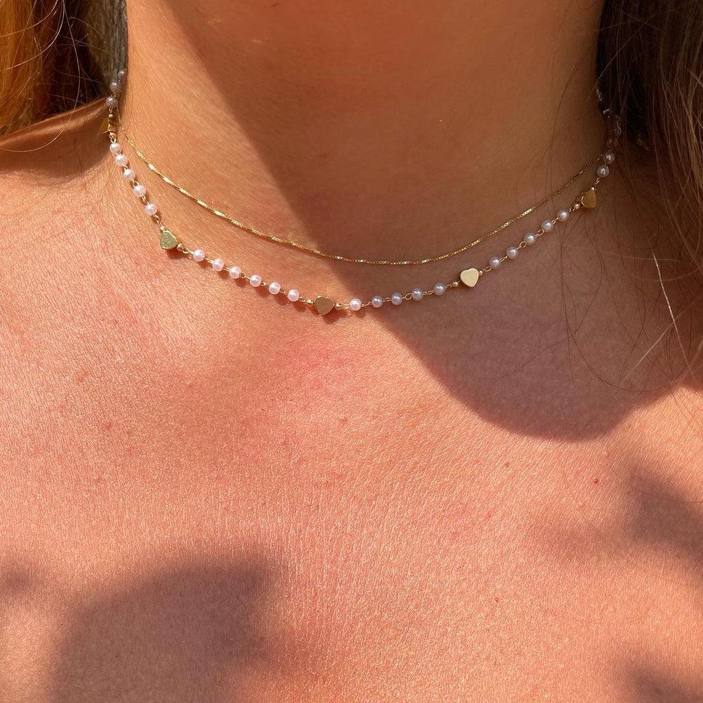Collana con piccole perle e cuori