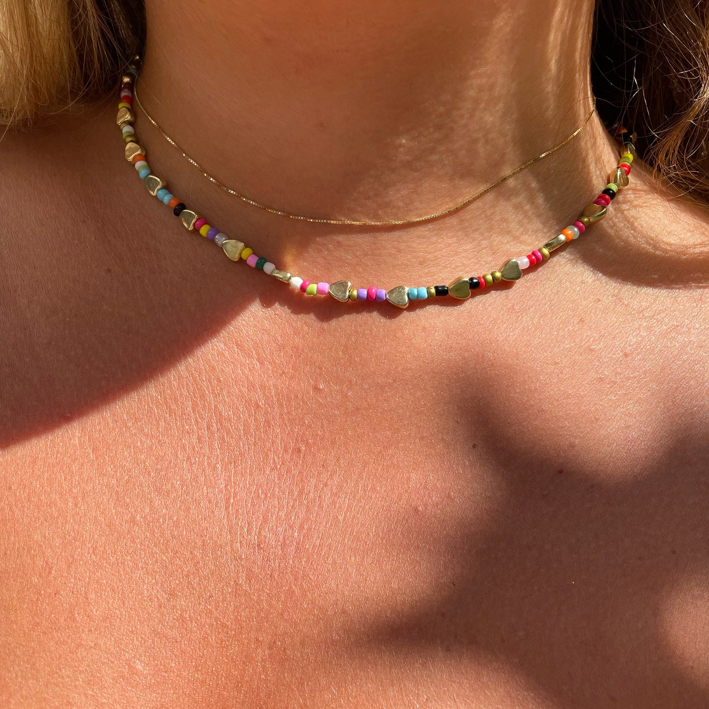 Collana con perline e cuori in 2 colori