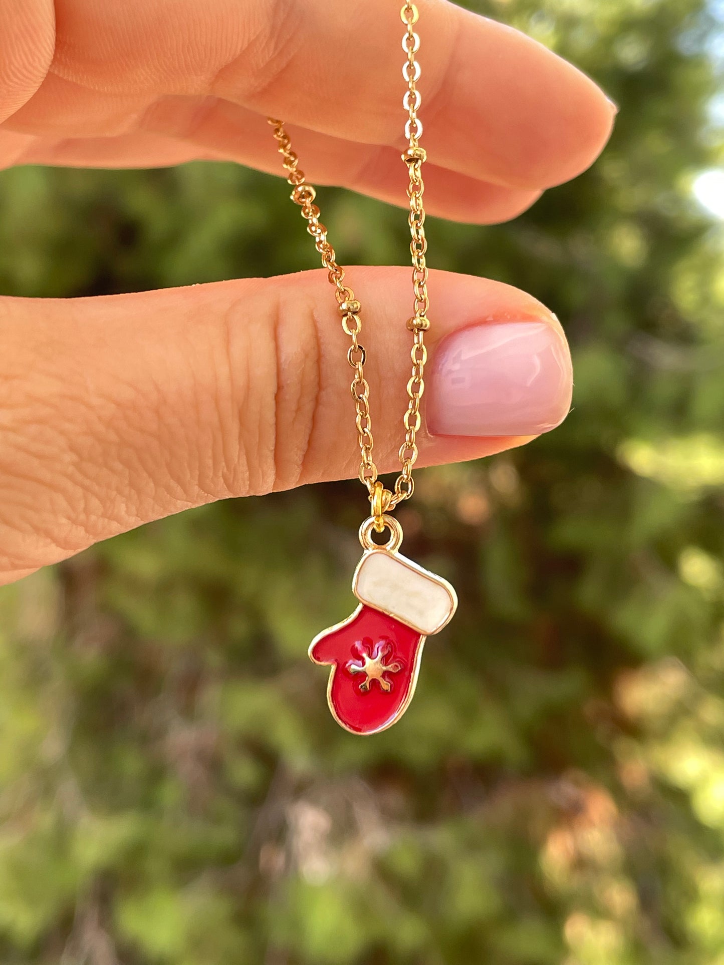 Collana con guanto natalizio