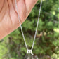 Collana con segno zodiacale in 2 colori