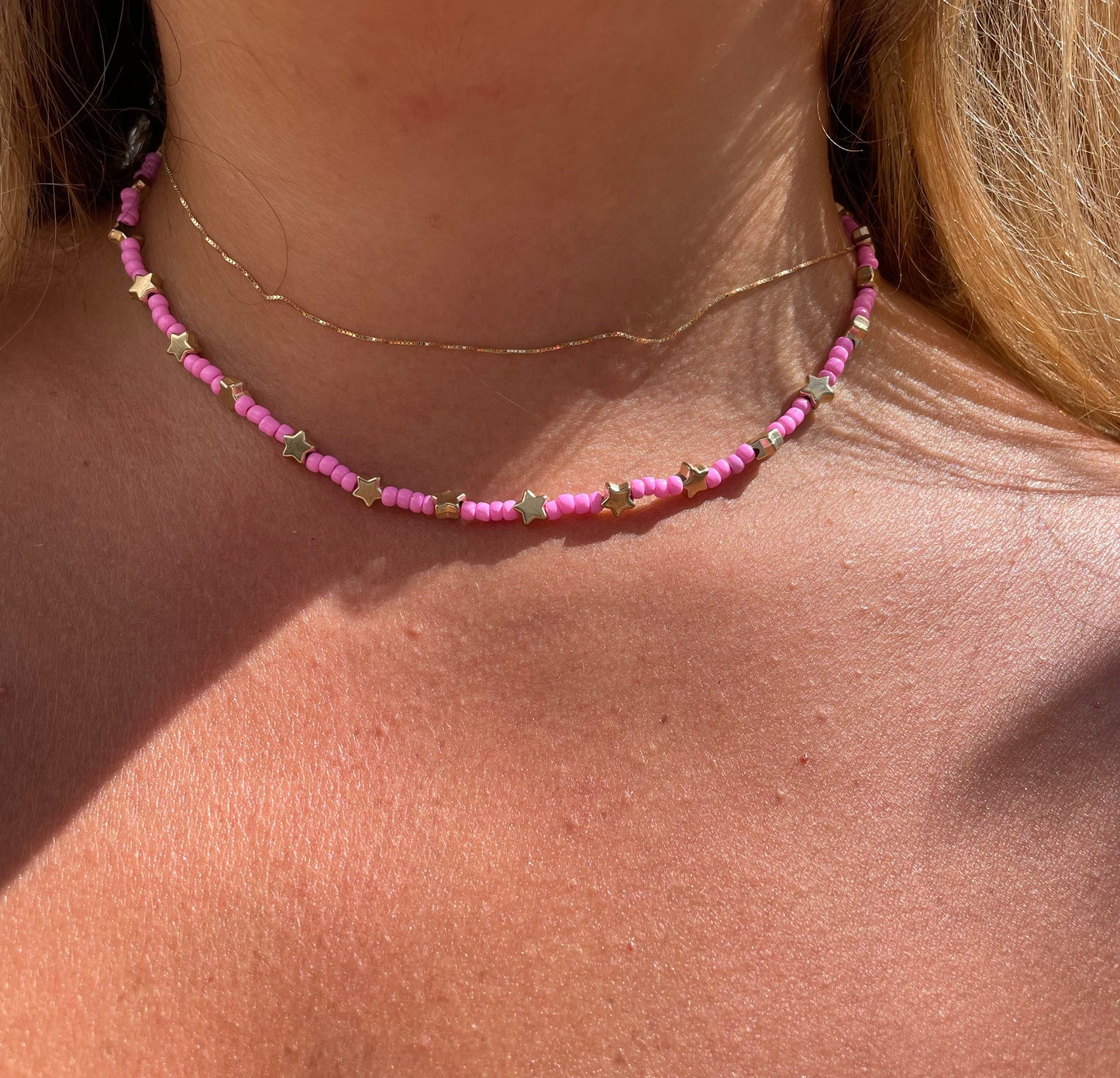Collana con perline e stelle in 2 colori