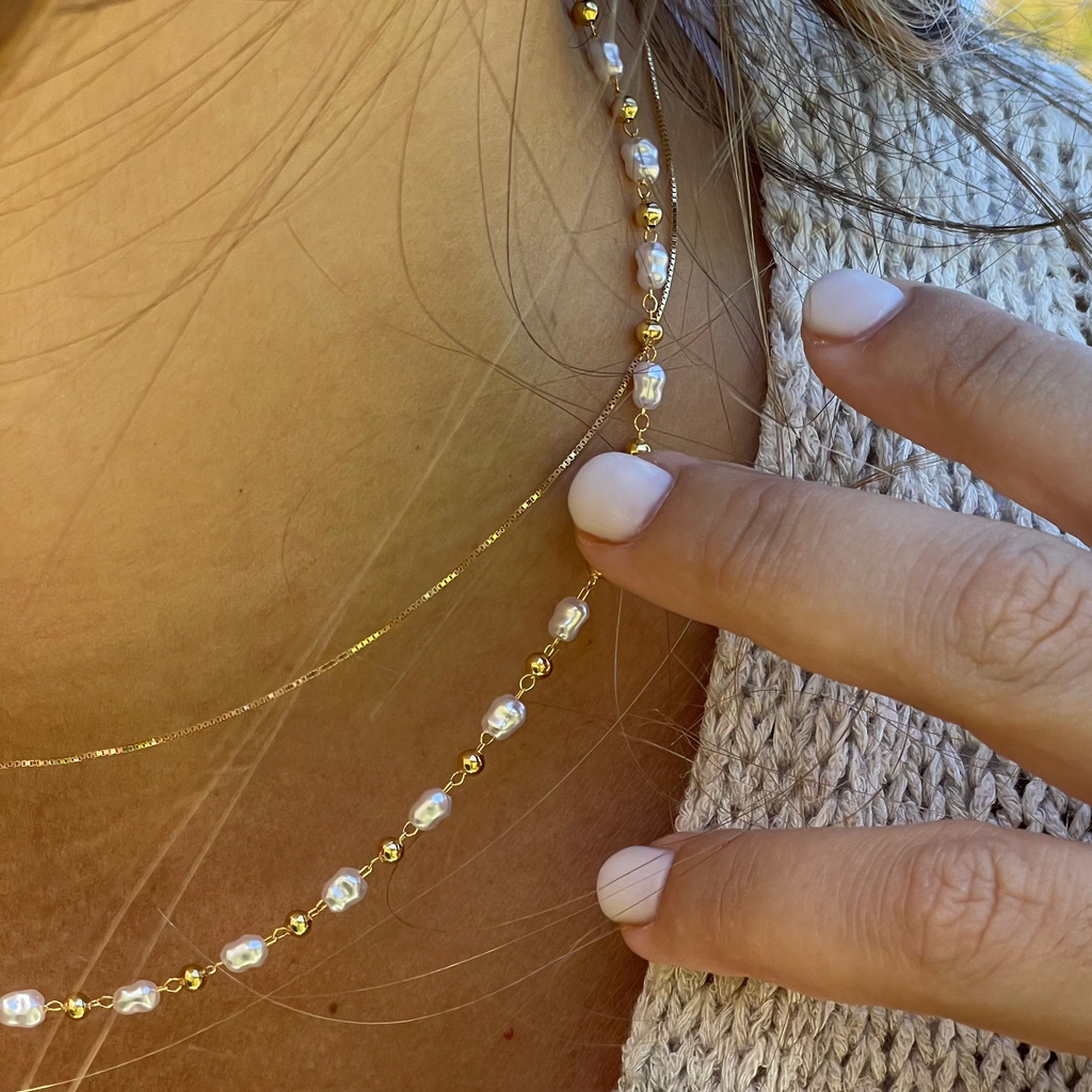 Collana con madreperla e palline dorate