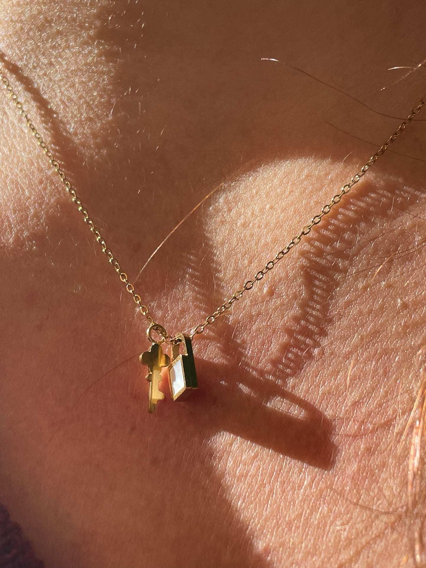 Collana chiave con lucchetto