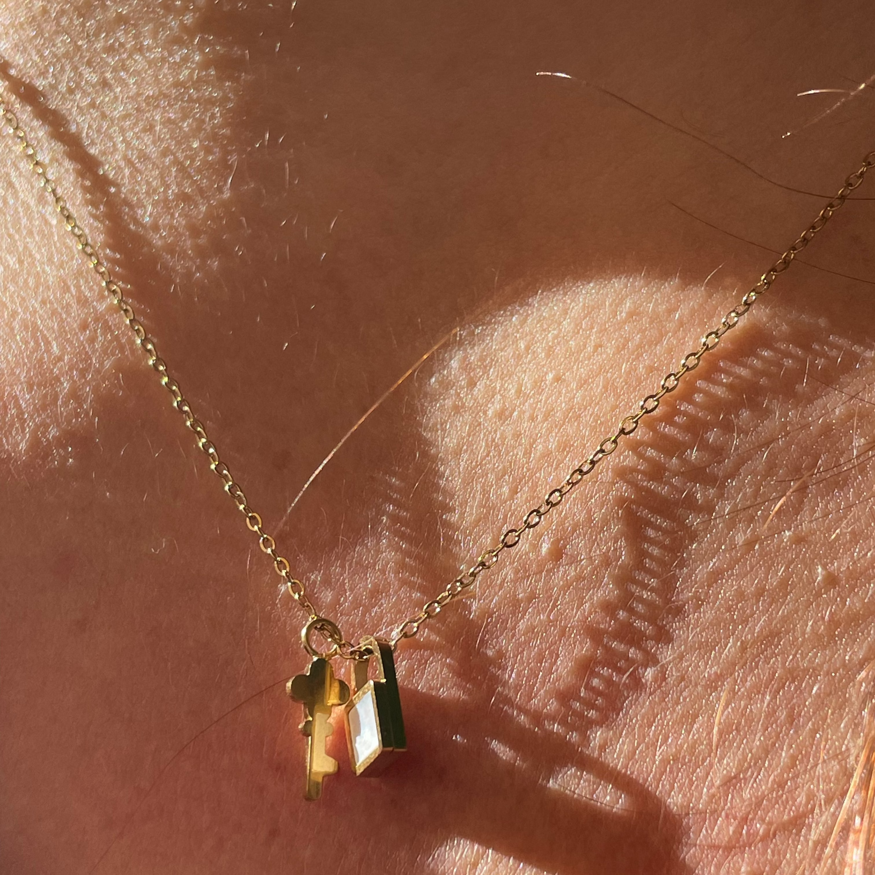 Collana chiave con lucchetto