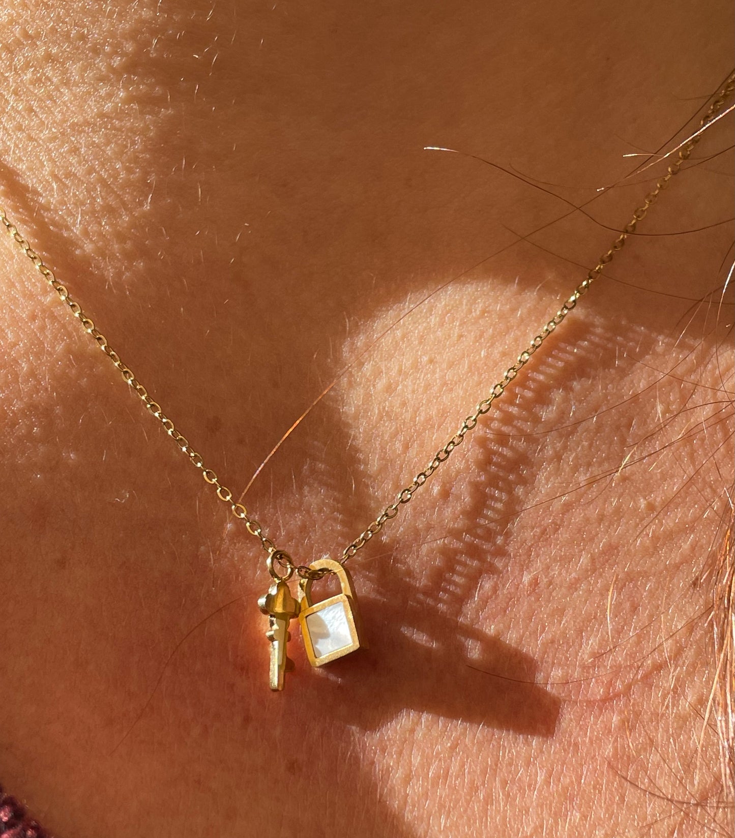 Collana chiave con lucchetto