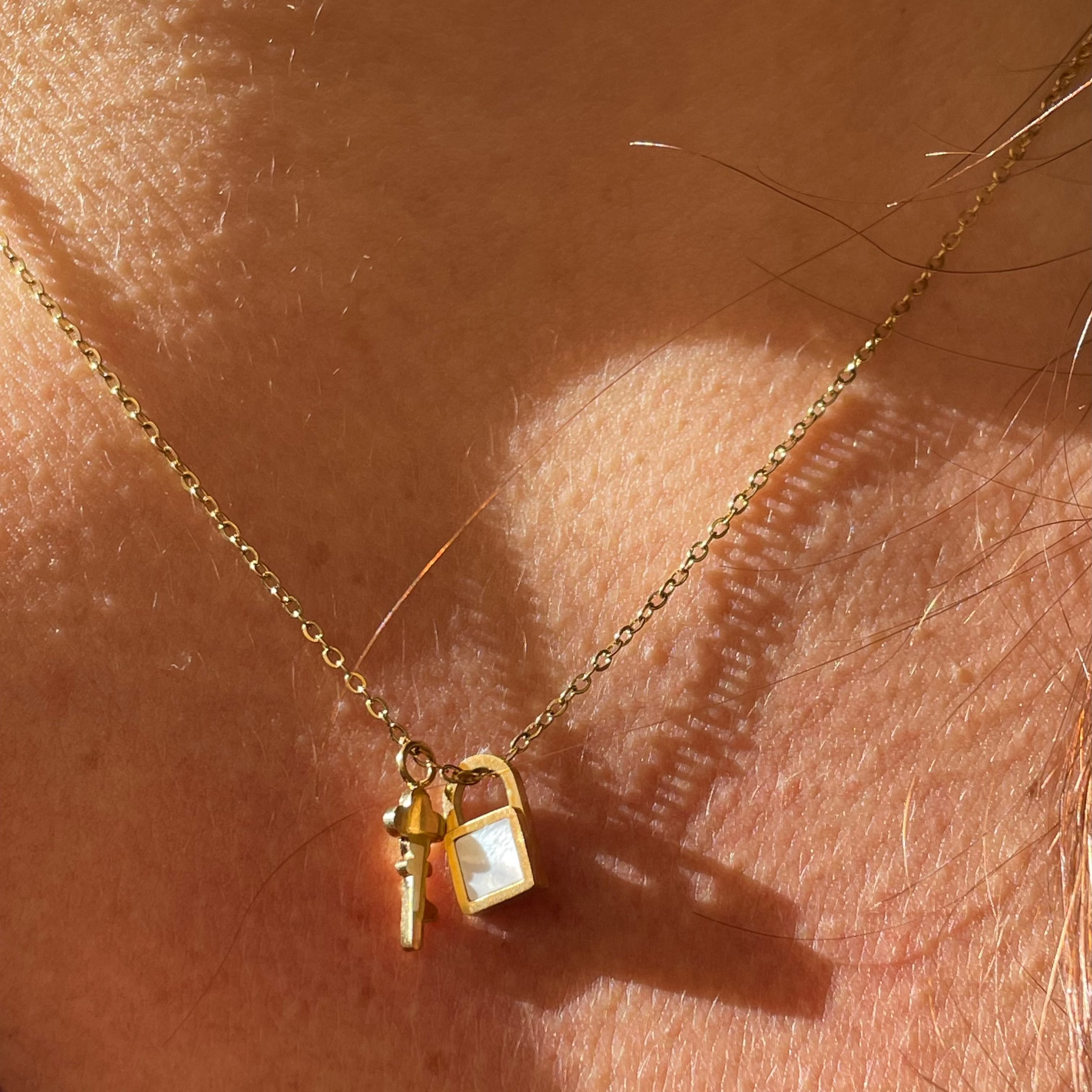 Collana chiave con lucchetto