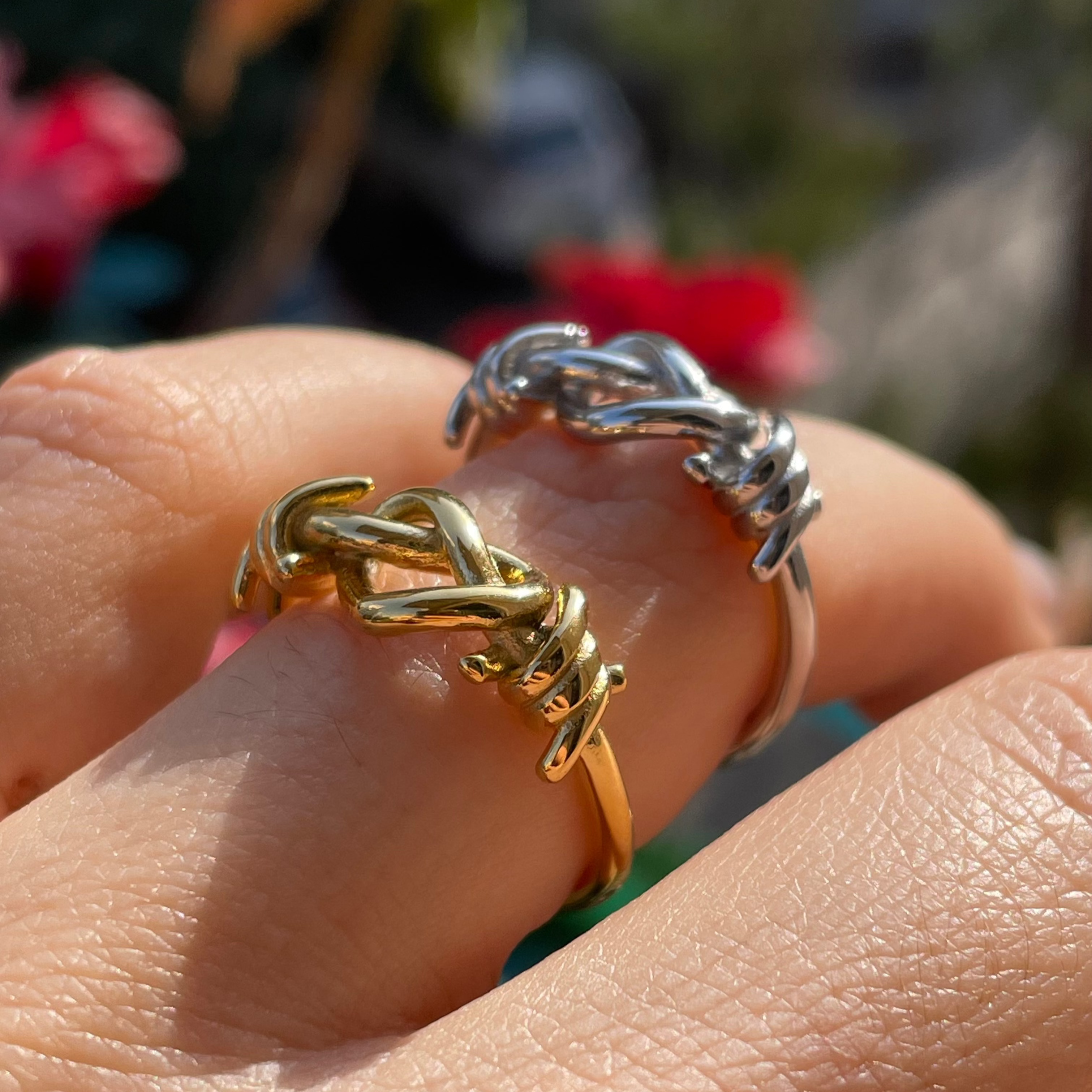 Anello con nodo che forma cuore in 2 colori